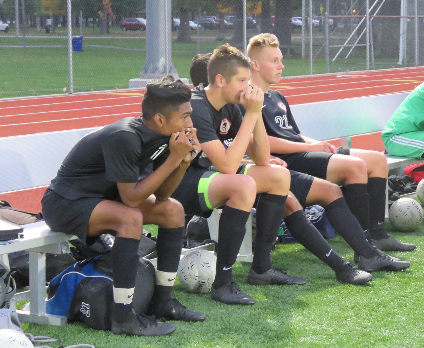 Members of the Niagara-Wheatfield boys soccer team sit on the bench following its defeat in the Niagara Frontier League title game versus Kenmore East. (Photo by David Yarger)